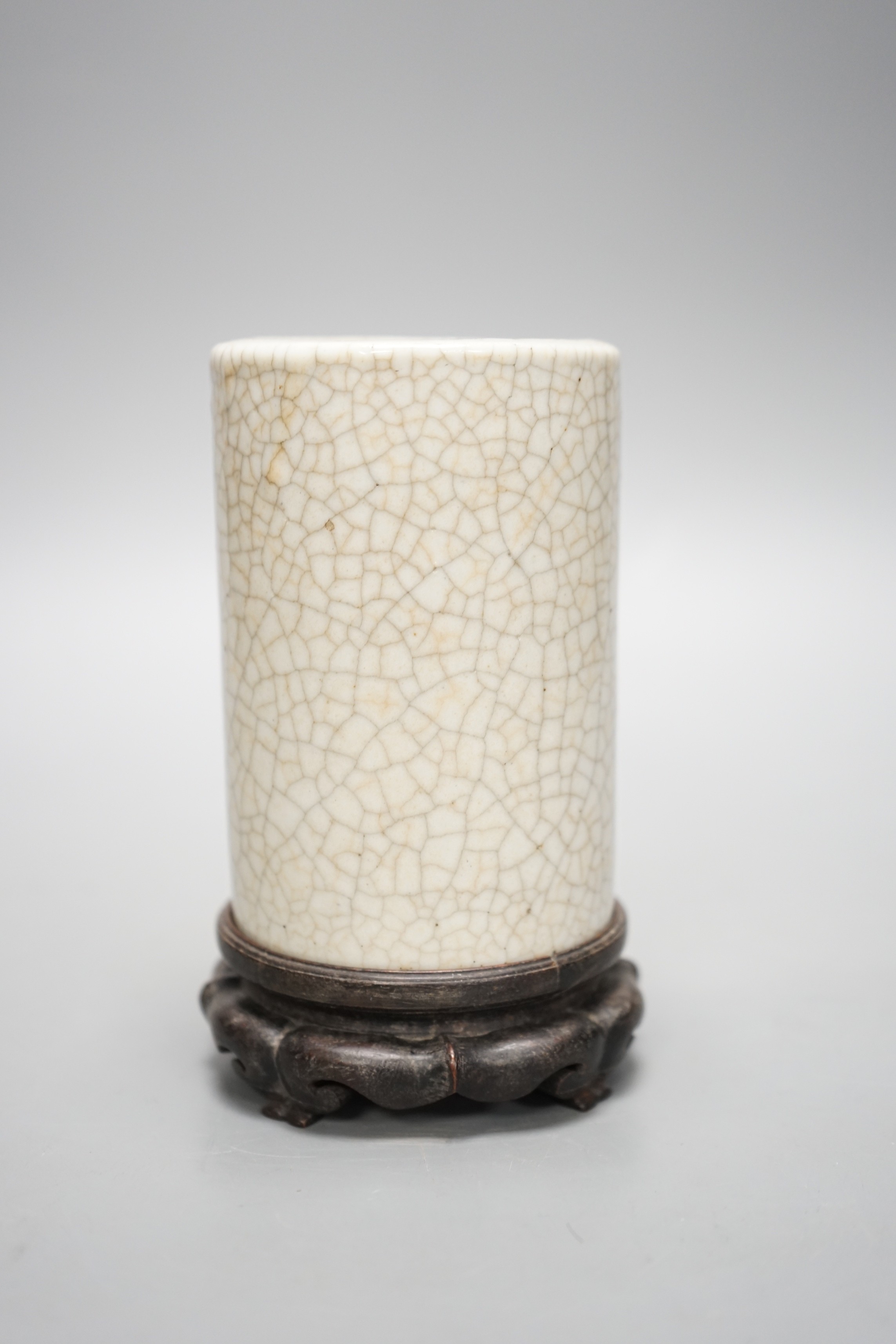 A Chinese crackle glaze brushpot, 19th century, wood stand, 14cm total